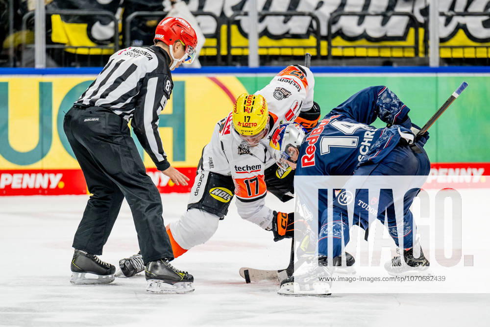 Linesperson David Tschirner fuehrt ein Bully Faceoff aus zwischen Carter Rowney (Loewen Frankfurt, 17) und Vadim Schreiner (EHC Red Bull Muenchen, 14) GER, EHC Red Bull Muenchen vs. Loewen Frankfurt, Eishockey, DEL, 32. Spieltag, Saison 2025 2026, 26.12.2025. GER, EHC Red Bull Muenchen vs. Loewen Frankfurt, Eishockey, DEL, 32. Spieltag, Saison 2025 2026, 26.12.2025. Muenchen