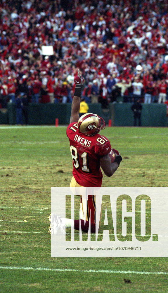 San Francisco, California, U.S - San Francisco 49ers vs. Green Bay Packers Candlestick Park Sunday, January 3, 1999. 49ers beat Packers 30-27. San Francisco 49ers wide receiver Terrell Owens (81) celebrates touchdown midfield.