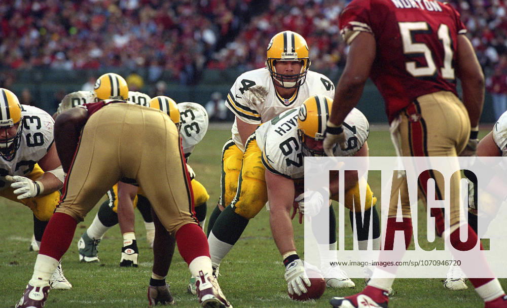 San Francisco, California, U.S - San Francisco 49ers vs. Green Bay Packers Candlestick Park Sunday, January 3, 1999. 49ers beat Packers 30-27. Green Bay Packers quarterback Brett Favre (4) over center Jeff Dellenbach