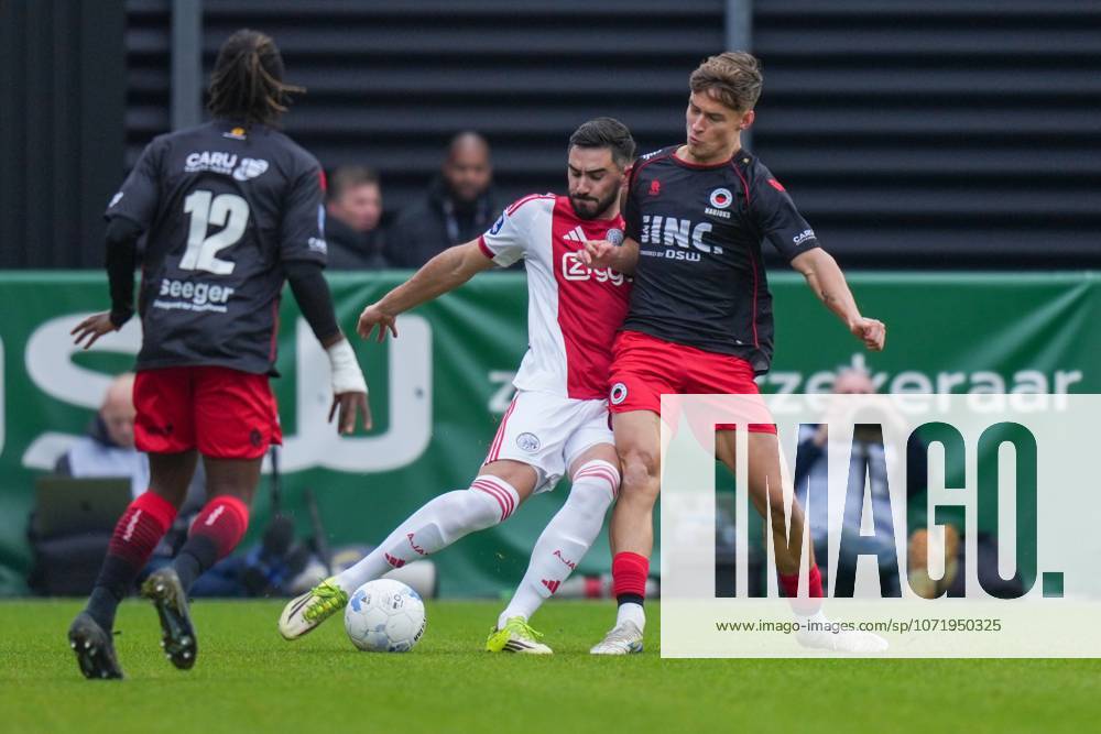 , Stadium Woudestein , season 2025 2026 , Dutch Eredivisie football , match between Excelsior Rotterdam and Ajax , picture shows Ajax player Josip Sutalo, Excelsior Rotterdam player Noah Naujoks Excelsior - Ajax x201236764x