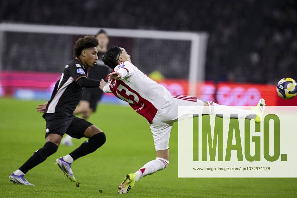 AMSTERDAM (l-r) NoÃ Lebreton of NEC Nijmegen and Rayane Bounida of AFC Ajax during the Dutch Eredivisie match between AFC Ajax and NEC at the Johan Cruijff ArenA on February 21, 2026, in Amsterdam, Netherlands. OLAF KRAAK ANP Eredivisie 2025-2026 ANPxSportx IVx 551394995 originalFilename: 551394995