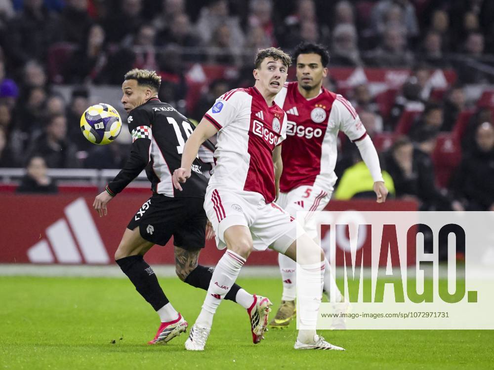 AMSTERDAM (l-r) Tjaronn Chery of NEC Nijmegen, Youri Baas of AFC Ajax, and Owen Wijndal of AFC Ajax during the Dutch Eredivisie match between AFC Ajax and NEC at the Johan Cruijff ArenA on February 21, 2026, in Amsterdam, Netherlands. OLAF KRAAK ANP Eredivisie 2025-2026 ANPxSportx IVx 551395628 originalFilename: 551395628