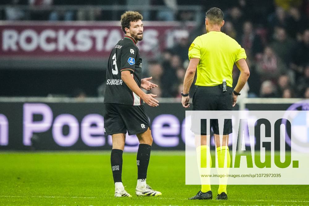 , JohanCruyff Arena , season 2025 2026 , Dutch Eredivisie football , match between Ajax and NEC Nijmegen , picture shows NEC player Philippe Sandler and referee Jeroen Manschot Ajax - NEC x201794408x