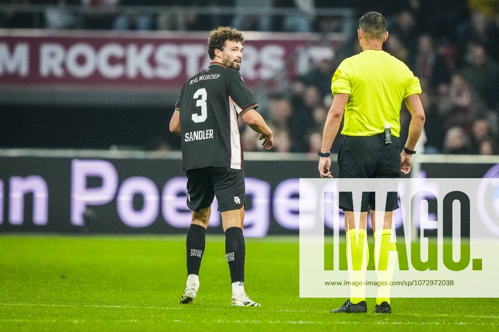 , JohanCruyff Arena , season 2025 2026 , Dutch Eredivisie football , match between Ajax and NEC Nijmegen , picture shows NEC player Philippe Sandler and referee Jeroen Manschot Ajax - NEC x201794409x