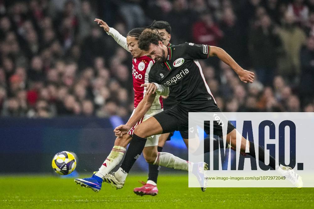 , JohanCruyff Arena , season 2025 2026 , Dutch Eredivisie football , match between Ajax and NEC Nijmegen , picture shows Ajax player Kian Fitz-Jim and NEC player Philippe Sandler Ajax - NEC x201794429x