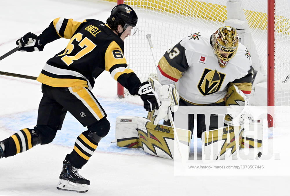 Pittsburgh Penguins right wing Rickard Rakell (67) chases the rebound off of Vegas Golden Knights goaltender Adin Hill (33) during the first period at PPG Paints Arena in Pittsburgh on Sunday, March 1, 2026. PIT2026030105 ARCHIExCARPENTER