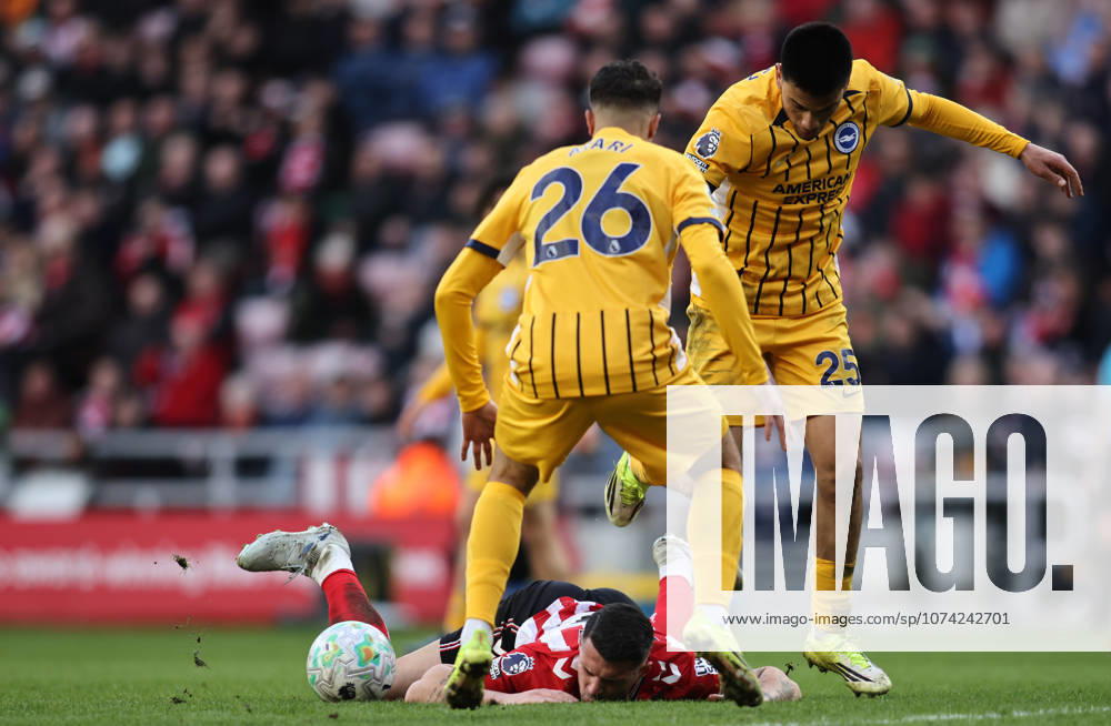 Sunderland v Brighton & Hove Albion - Premier League Granit Xhaka of Sunderland is fouled by Diego Gomez and Yasin Ayari of Brighton and Hove Albion during the Premier League match between Sunderland and Brighton and Hove Albion at the Stadium of Light, Sunderland, on March 14, 2026. Sunderland Tyne and Wear United Kingdom