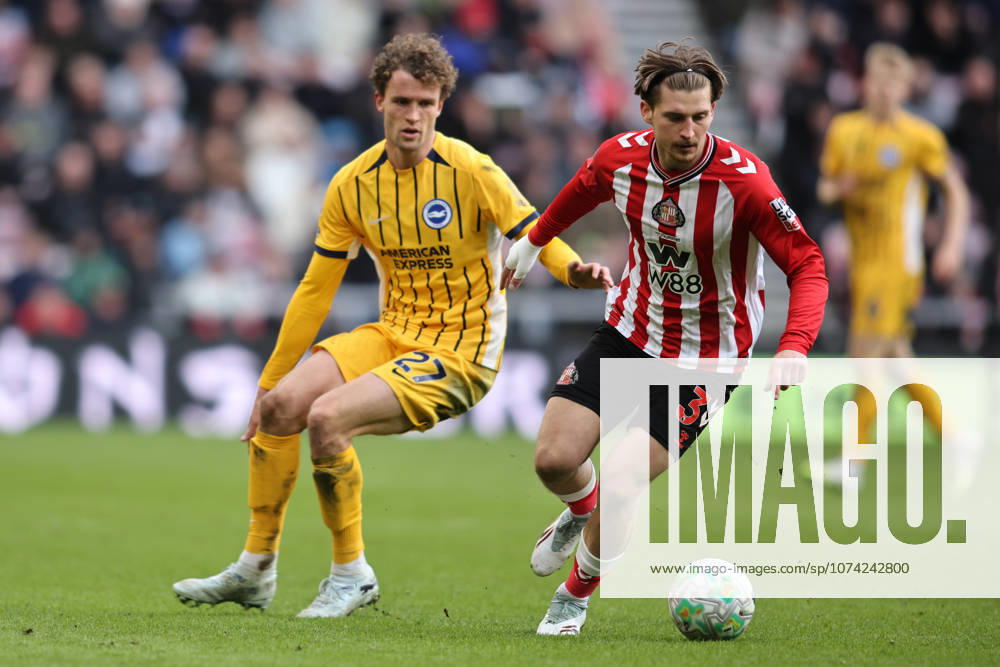 Sunderland v Brighton & Hove Albion - Premier League Dennis Cirkin of Sunderland turns away from Mats Wieffer of Brighton and Hove Albion during the Premier League match between Sunderland and Brighton and Hove Albion at the Stadium of Light in Sunderland, United Kingdom, on March 14, 2026. Sunderland Tyne and Wear United Kingdom