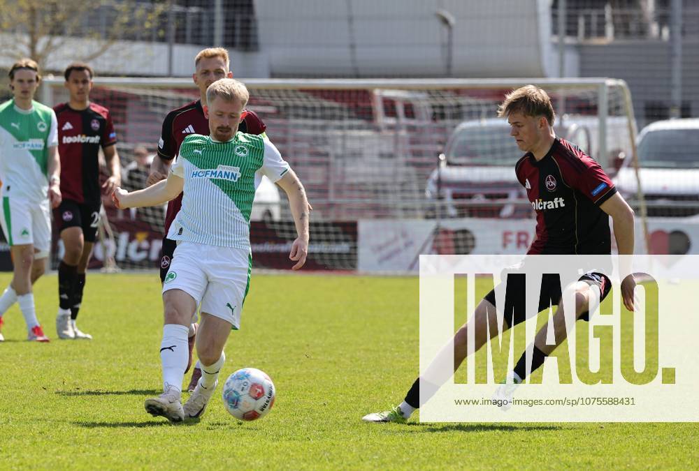 Fussball - Saison 2025 2026 - Regionalliga Bayern - 27. Spieltag: 1. FC Nürnberg FCN II ( Club ) - SpVgg Greuther Fürth II (Kleeblatt U23 ) - DaMa - - Jomaine Consbruch (11, SpVgg Greuther Fürth II ) Eric Porstner (16, 1. FC Nürnberg FCN II )