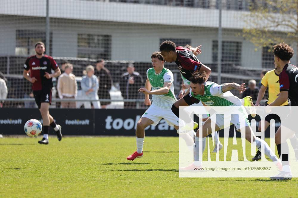 Fussball - Saison 2025 2026 - Regionalliga Bayern - 27. Spieltag: 1. FC Nürnberg FCN II ( Club ) - SpVgg Greuther Fürth II (Kleeblatt U23 ) - DaMa - - Noah König Koenig (4, SpVgg Greuther Fürth II ) Noah Maboulou (37, 1. FC Nürnberg FCN II )