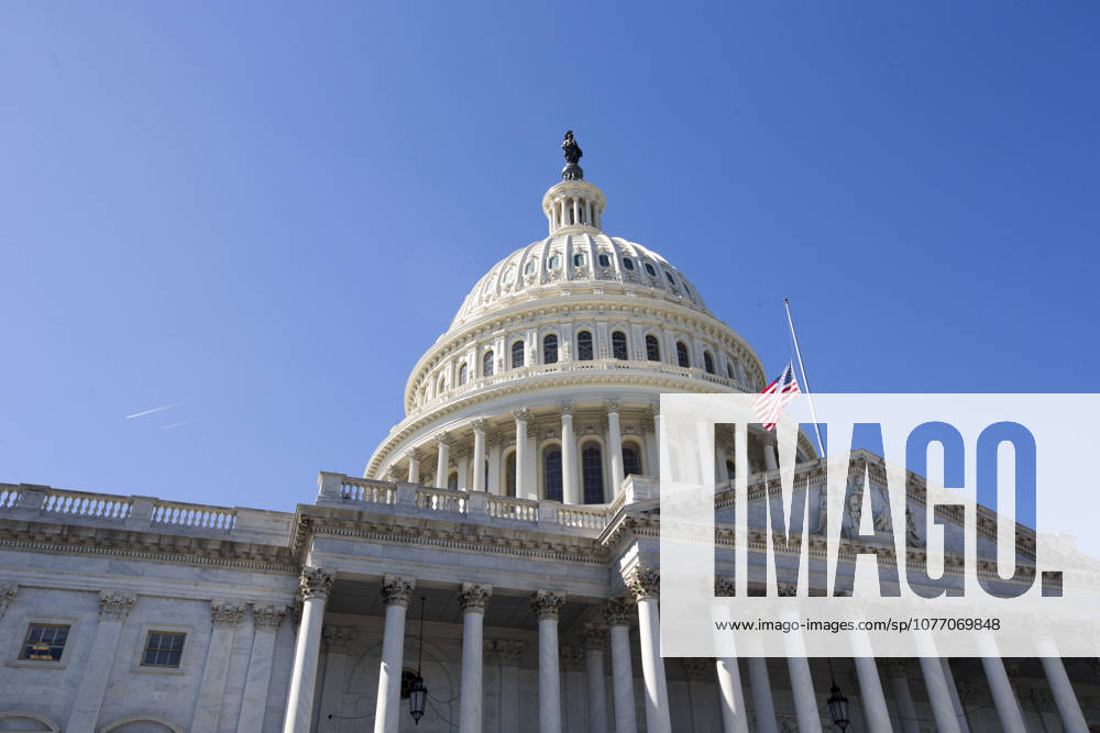 Washington, District Of Columbia, USA - The flag of the United States of America flies at half-staff above the United States Capitol Building a day after the deadliest mass shooting in American history in Las Vegas, Nevada.