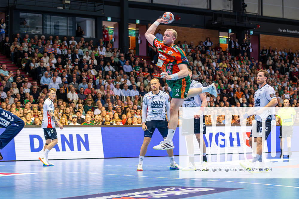 Justus Fischer (TSV Hannover-Burgdorf, Nr. 54) (L-R), TSV Hannover-Burgdorf (orange) against SG Flensburg-Handewitt (blue) (second-leg of the quarter-finals the EHF European League 2025 2026) (05.05.2026, Swiss Life Hall (Hannover, GER),