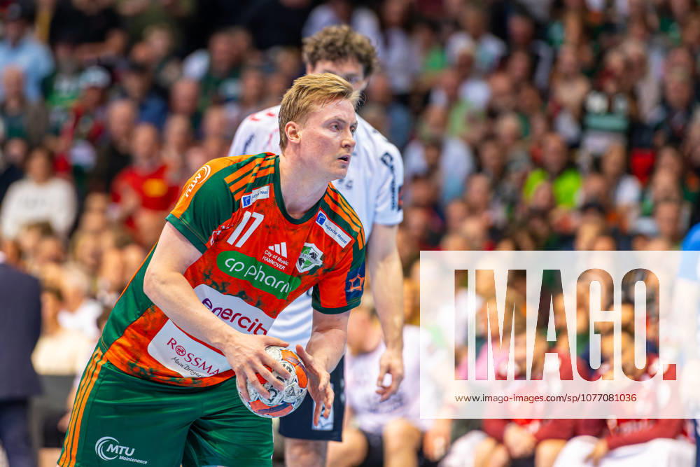 August Pedersen (TSV Hannover-Burgdorf, Nr. 17) (L-R), TSV Hannover-Burgdorf (orange) against SG Flensburg-Handewitt (blue) (second-leg of the quarter-finals the EHF European League 2025 2026) (05.05.2026, Swiss Life Hall (Hannover, GER),