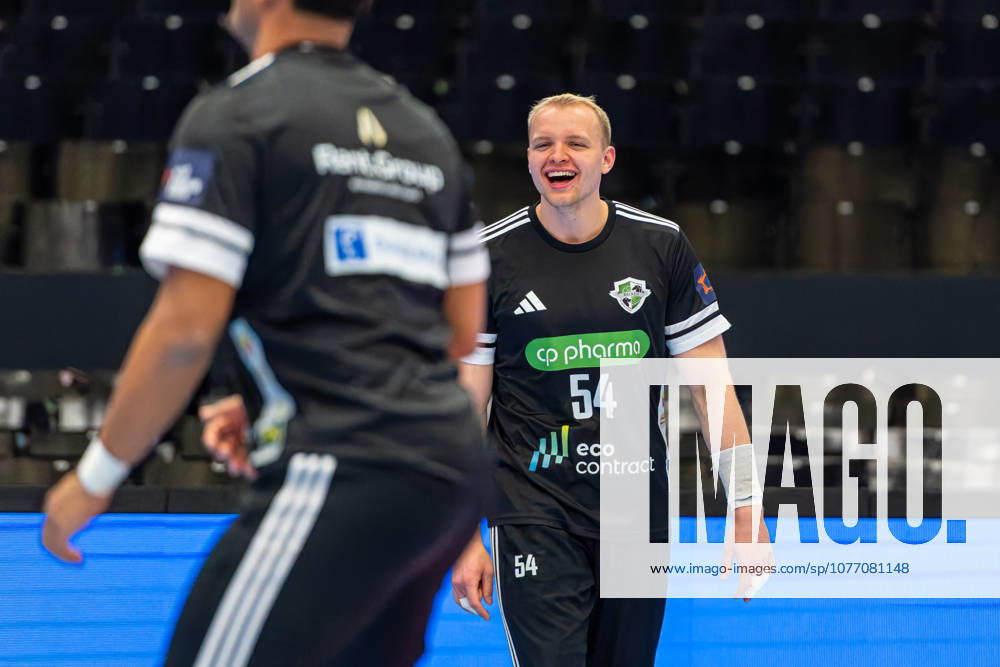 Justus Fischer (TSV Hannover-Burgdorf, Nr. 54) (L-R), TSV Hannover-Burgdorf (orange) against SG Flensburg-Handewitt (blue) (second-leg of the quarter-finals the EHF European League 2025 2026) (05.05.2026, Swiss Life Hall (Hannover, GER),