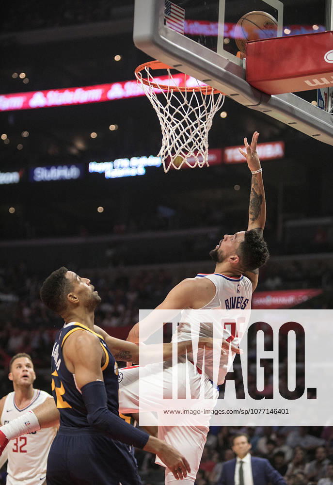 Los Angeles, California, U.S - Austin Rivers 25 of the Los Angeles Clippers goes for a reverse layup during their regular season NBA, Basketball Herren, USA game against the Utah Jazz on Tuesday October 24, 2017 at the Staples Center in Los Angeles, California. Clippers defeats Jazz, 102-84.