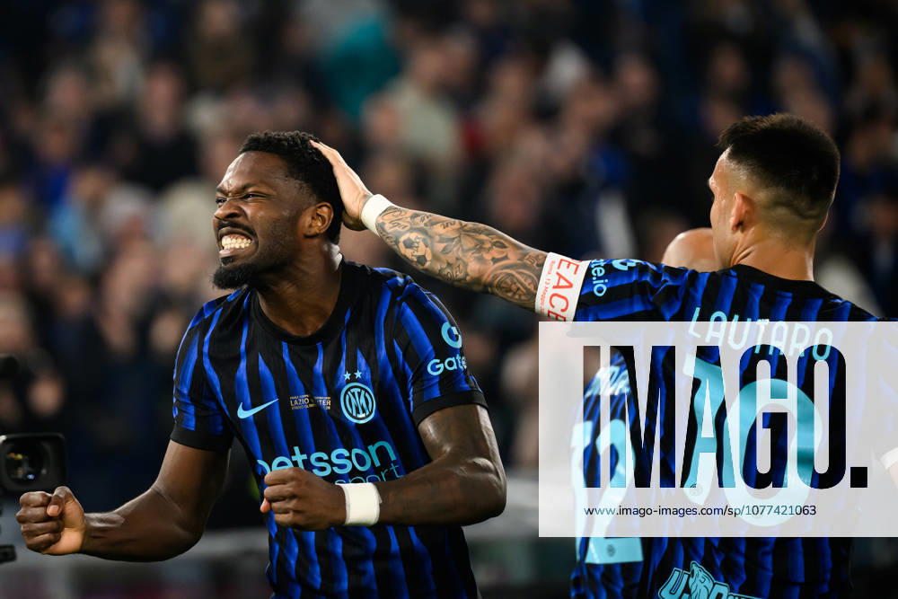 Marcus Thuram of FC Internazionale celebrates with Lautaro Martinez after scoring the goal of 0-1 during the 2025 2026 Coppa Italia football final between SS Lazio and FC Internazionale at Stadio Olimpico in Rome (Italy), May 13, 2026. AndreaxStaccioli
