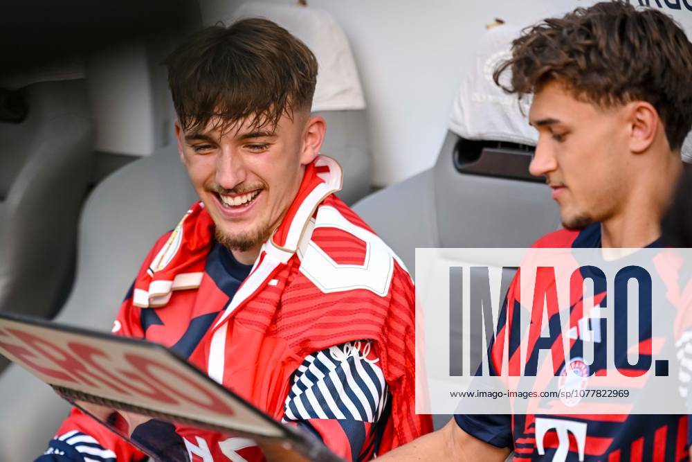 Lennart Karl (FC Bayern München) and Tom Bischof (FC Bayern München) Looks on during the DFB Cup Final 2026 match between FC Bayern München and VfB Stuttgart at Olympiastadion on May 23, 2026 in Berlin, Germany. (Photo by Harry Langer DeFodi Images) -