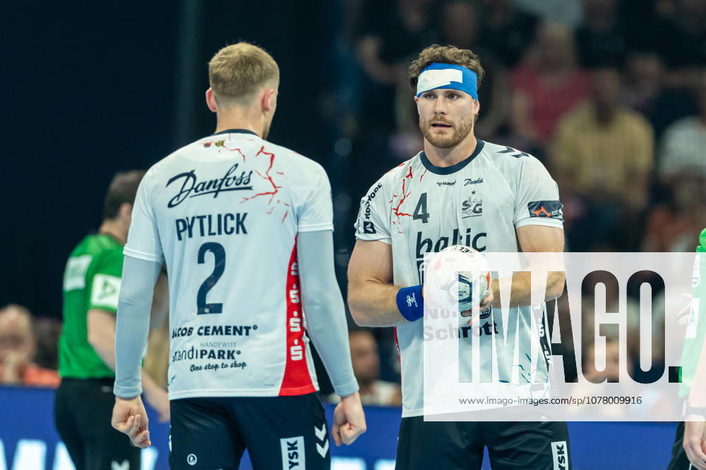 Simon Pytlick (SG Flensburg-Handewitt) und Johannes Golla (SG Flensburg-Handewitt) speaks with during the handball semi-final of the the Winamax EHF Finals 2026 between MT Melsungen and SG Flensburg-Handewitt at Barclays Arena on May 30, 2026 in Hamburg, Germany. -
