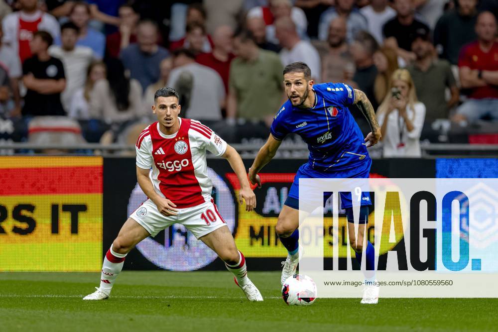 AMSTERDAM - AFC Ajax Amsterdam midfielder Oscar Gloukh, FK Vojvodina forward Aleksa Vukanovic during the Conference League match between AFC Ajax and FK Vojvodina at the Johan Cruijff ArenA on July 30, 2026 in Amsterdam, the Netherlands. (Photo by DeFodi Images) -