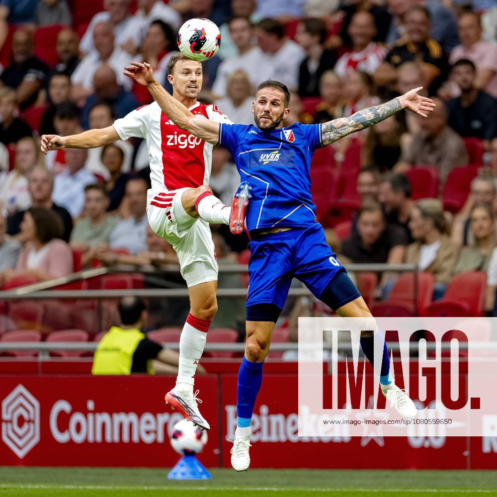 AMSTERDAM - AFC Ajax Amsterdam midfielder Youri Regeer, FK Vojvodina forward Aleksa Vukanovic during the Conference League match between AFC Ajax and FK Vojvodina at the Johan Cruijff ArenA on July 30, 2026 in Amsterdam, the Netherlands. (Photo by Marcel van Dorst EYE4IMAGES)