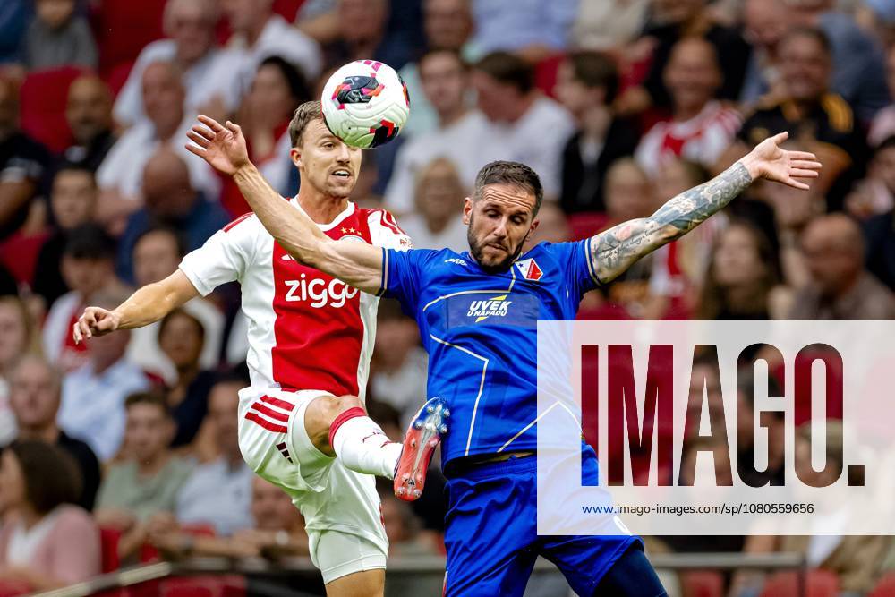 AMSTERDAM - AFC Ajax Amsterdam midfielder Youri Regeer, FK Vojvodina forward Aleksa Vukanovic during the Conference League match between AFC Ajax and FK Vojvodina at the Johan Cruijff ArenA on July 30, 2026 in Amsterdam, the Netherlands. (Photo by DeFodi Images) -