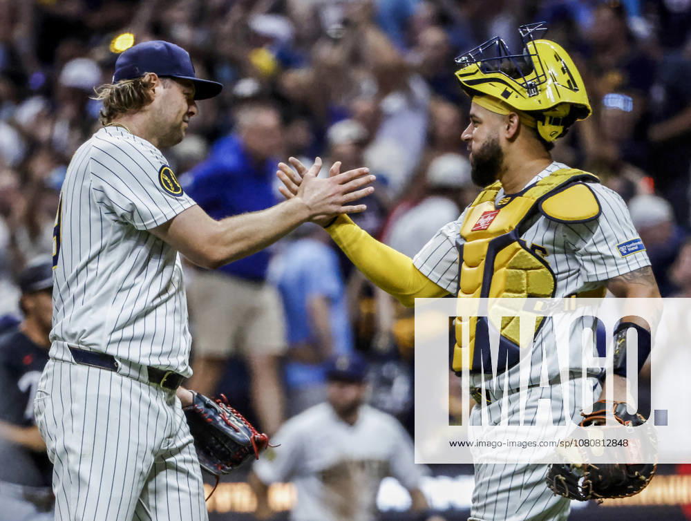 Milwaukee Brewers closing pitcher Trevor Megill (L) and Milwaukee Brewers catcher William Contreras celebrate after the final out in the ninth inning of the MLB, Baseball Herren, USA game between the Minnesota Twins and the Milwaukee Brewers at American Family Field in Milwaukee, Wisconsin on Saturday, August 8, 2026. The Brewers defeated the Twins 4-3. MIL20250808845 TANNENxMAURY