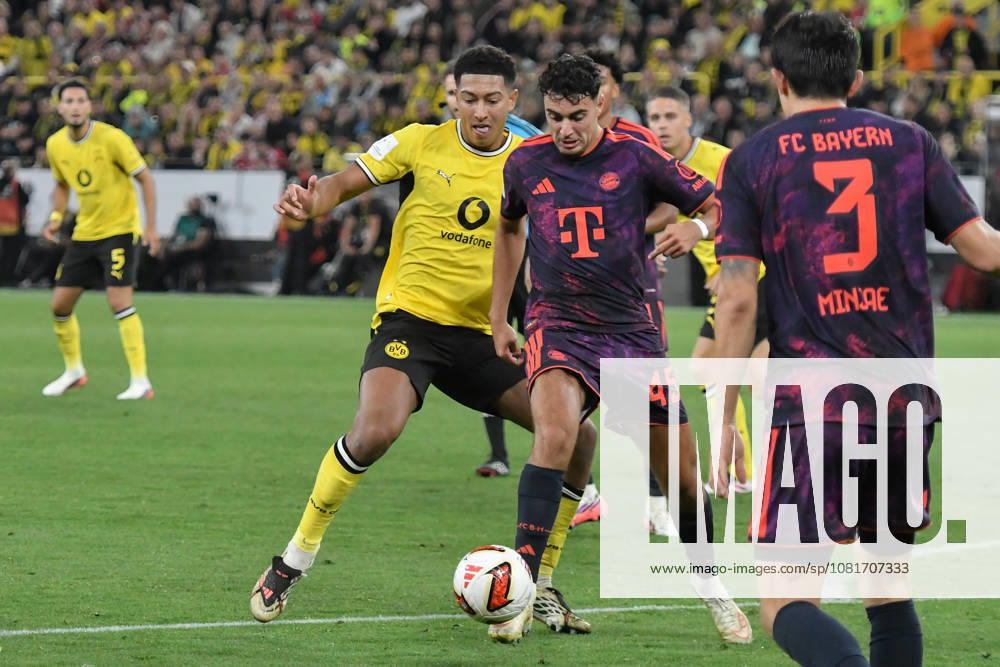 V. li. im Zweikampf Jobe Bellingham (Dortmund 7) Aleksandar Pavlovic (Bayern 45) 22.08.2026 ¢ Fussball ¢ Borussia Dortmund vs FC Bayern München ¢ Super Cup, Signal Iduna Park, Dortmund, DFB DFL REGULATIONS PROHIBIT ANY USE OF PHOTOGRAPHS AS IMAGE SEQUENCES AND OR QUASI-VIDEO NRW Germany