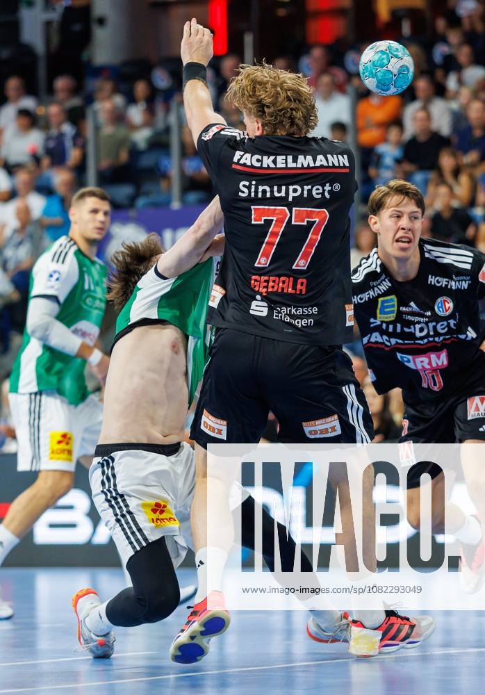 Handball - 1. Bundesliga OPEL HBL - Saison 2026 2027 - 02. Spieltag: HC Erlangen Metropolregion Nürnberg HCE - TSV Hannover-Burgdorf ( Die Recken ) - DaMa - - Leif Tissier (7, TSV Hannover-Burgdorf ) Maciej Gebala (77, HC Erlangen HCE ) Florian Scheerer (10, HC Erlangen HCE )