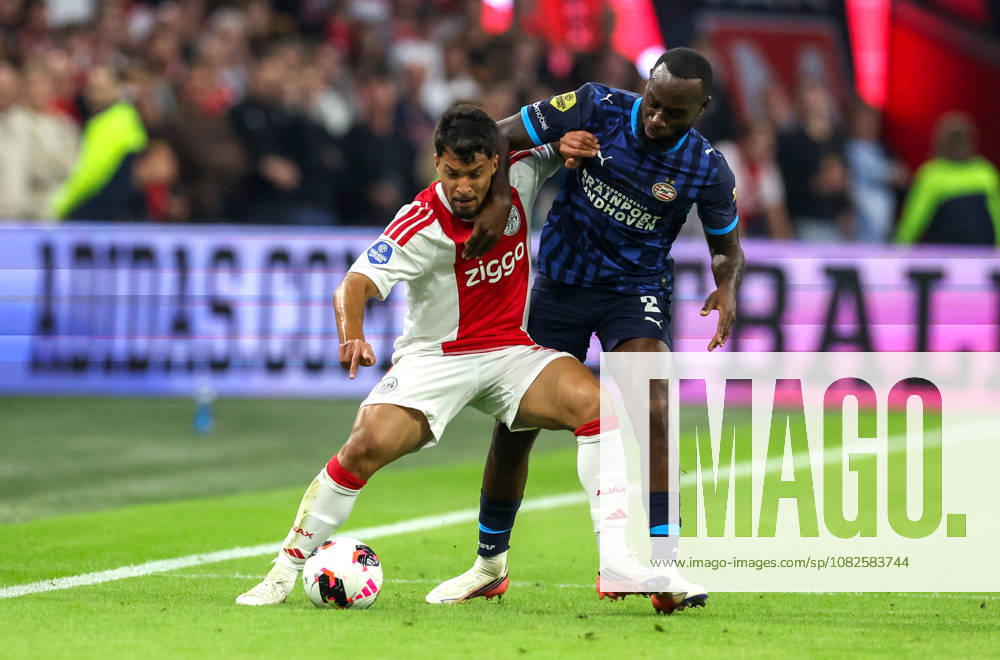 AMSTERDAM - AFC Ajax Amsterdam forward Marcos Leonardo with PSV Eindhoven defender Lutsharel Geertruida during the Vriendenloterij Eredivisie match between Ajax and PSV at Johan Cruijff ArenA on 5 September 2026 in Amsterdam, Nederland. PETER LOUS EYE4IMAGES DeFodi Images -