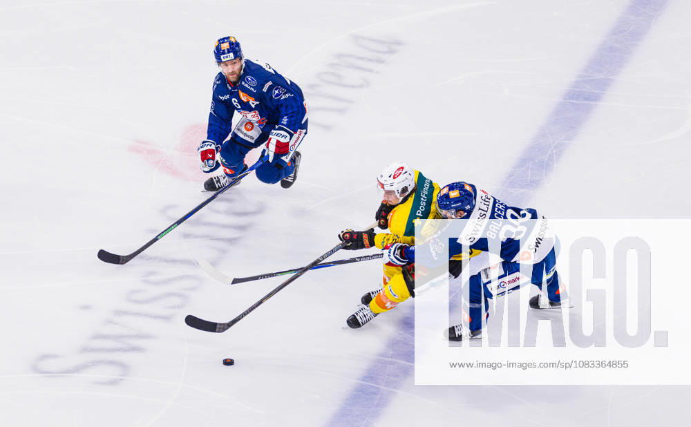 Ice hockey, Eishockey National League Regular Season - ZSC Lions vs. SC Ber Zurich, Switzerland, 15th Sep 2026: A duel between 23 Marco Lehmann (Bern) and 38 Rudolf Balcers (ZSC Lions). Defender 6 Yannick Weber (ZSC Lions) observes.
