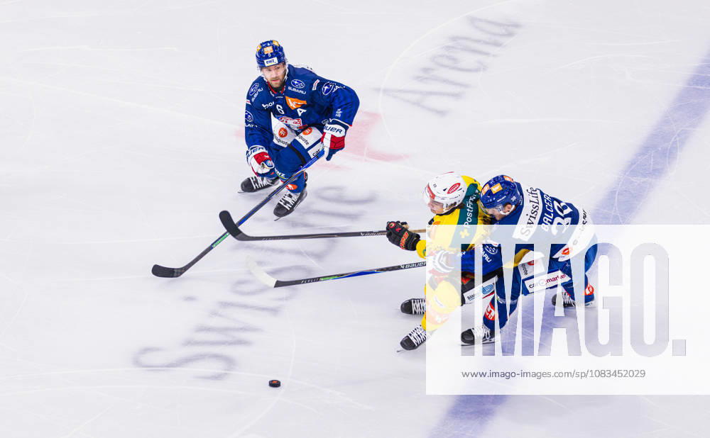 Ice hockey, Eishockey National League Regular Season - ZSC Lions vs. SC Ber Zurich, Switzerland, 15th Sep 2026: 38 Rudolf Balcers (ZSC Lions) battles against 23 Marco Lehmann (Bern). Defenseman 6 Yannick Weber (ZSC Lions) comes in to provide support.