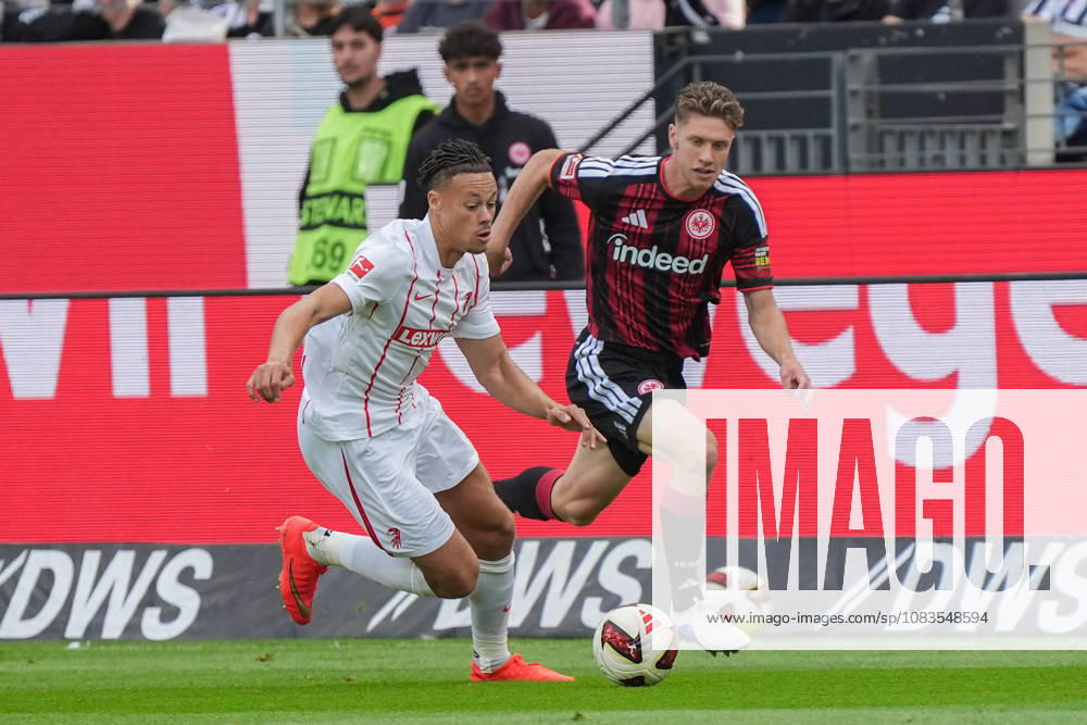 Derry Scherhant (SC Freiburg, 7) im Zweikampf mit Elias Baum (Eintracht Frankfurt) - 19.09.2026 Bundesliga, Saison 26 27: Eintracht Frankfurt vs. SC Freiburg, Deutsche Bank Park, 4. Spieltag