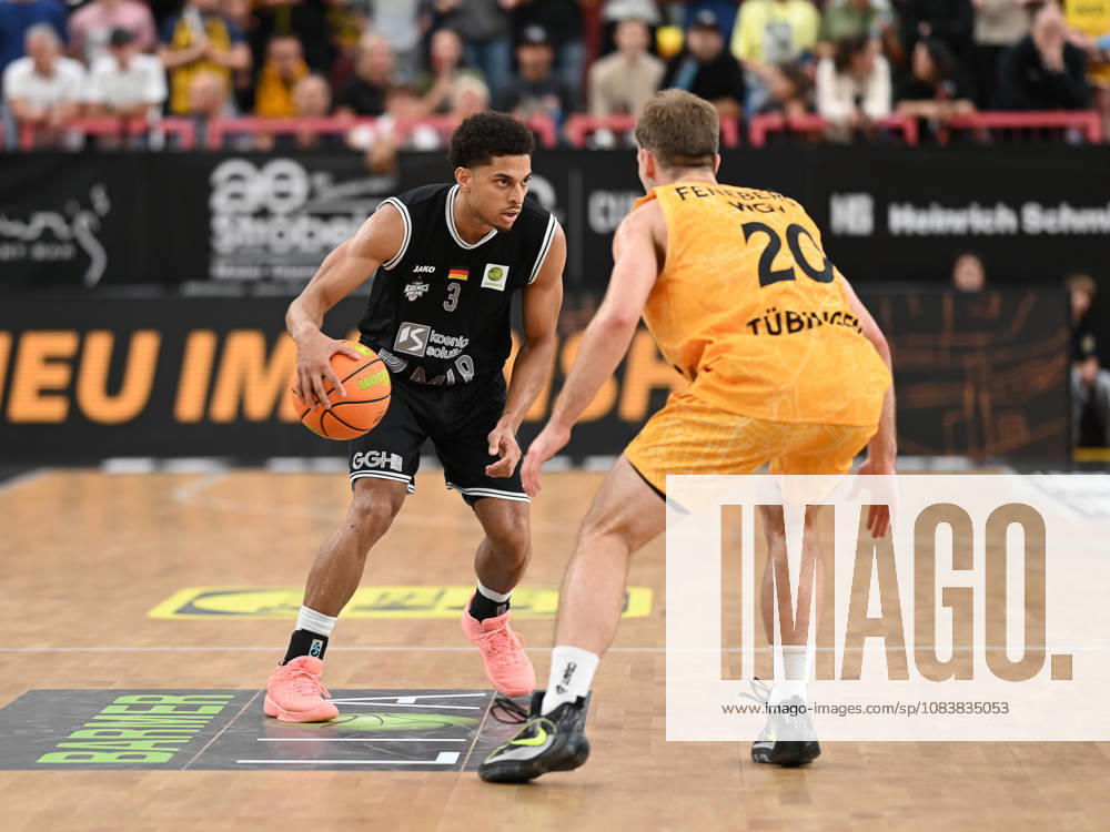 Kevin McClain (MLP Academics Heidelberg, 03) gegen Simon Feneberg (Tigers Tuebingen, 20) GER, Tigers Tuebingen vs. MLP Academics Heidelberg, Basketball, ProA, 1. Spieltag, Spielzeit 2026 2027, 26.09.2026 GER, Tigers Tuebingen vs. MLP Academics Heidelberg, Basketball, ProA, 1. Spieltag, Spielzeit 2026 2027, 26.09.2026 Tigers Tuebingen