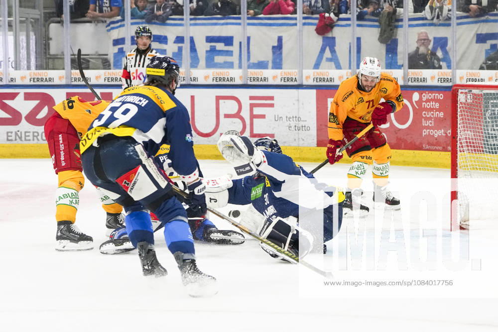 Quinto, Gottardo Arena, NL: HC Ambrì-Piotta v SCL Tigers: 71 Julian Schmutz (Tigers) scores against 30 goalkeeper Philip Wuthrich (Ambri) Quinto Gottardo Arena Ticino Switzerland
