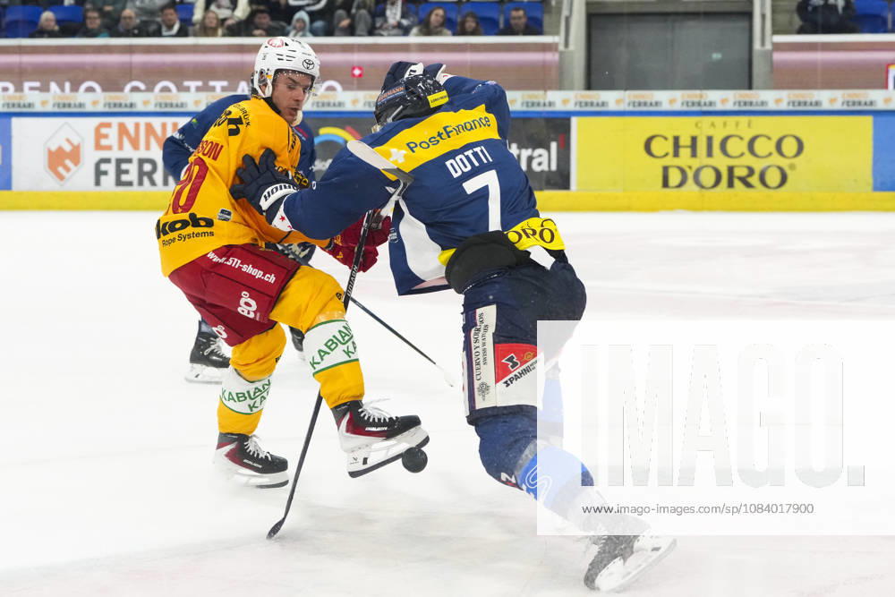 Quinto, Gottardo Arena, NL: HC Ambrì-Piotta v SCL Tigers: 7 Isacco Dotti (Ambri) against 20 Andre Petersson (Tigers) Quinto Gottardo Arena Ticino Switzerland