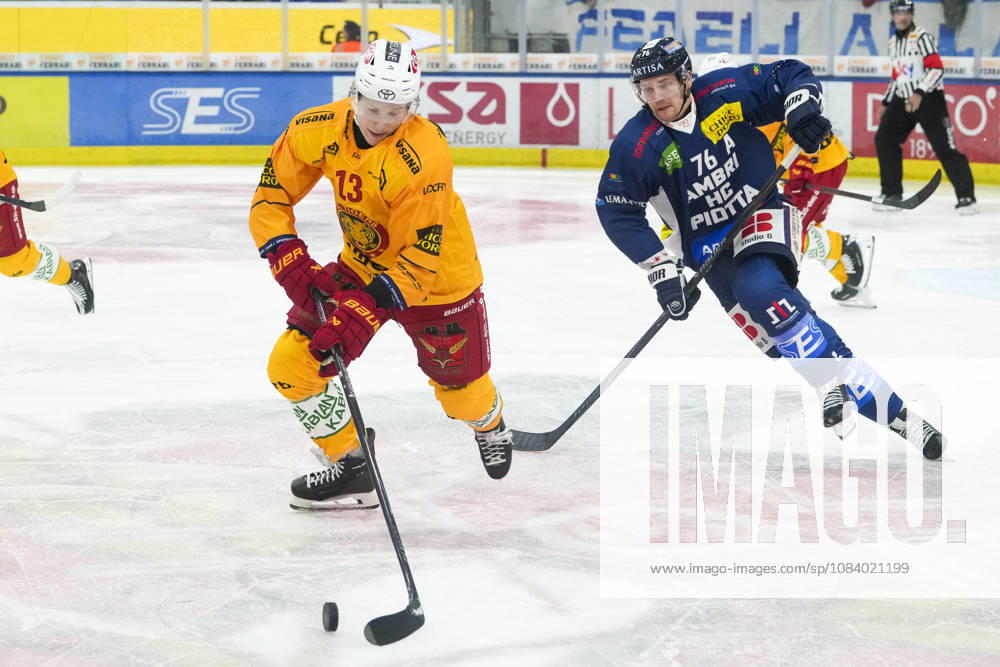 Quinto, Gottardo Arena, NL: HC Ambrì-Piotta v SCL Tigers: 13 Oskars Lapinskis (Tigers) against 76 Nathan Schnarr (Ambri) Quinto Gottardo Arena Ticino Switzerland