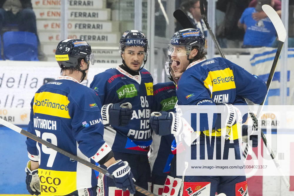 Quinto, Gottardo Arena, NL: HC Ambrì-Piotta v SCL Tigers: 44 Andre Heim (Ambri) (R), 59 Dario Wuthrich (Ambri) (L) and 86 Rocco Pezzullo (Ambri) (2nd L) celebrates 43 Tim Muggli (Ambri) goal Quinto Gottardo Arena Ticino Switzerland