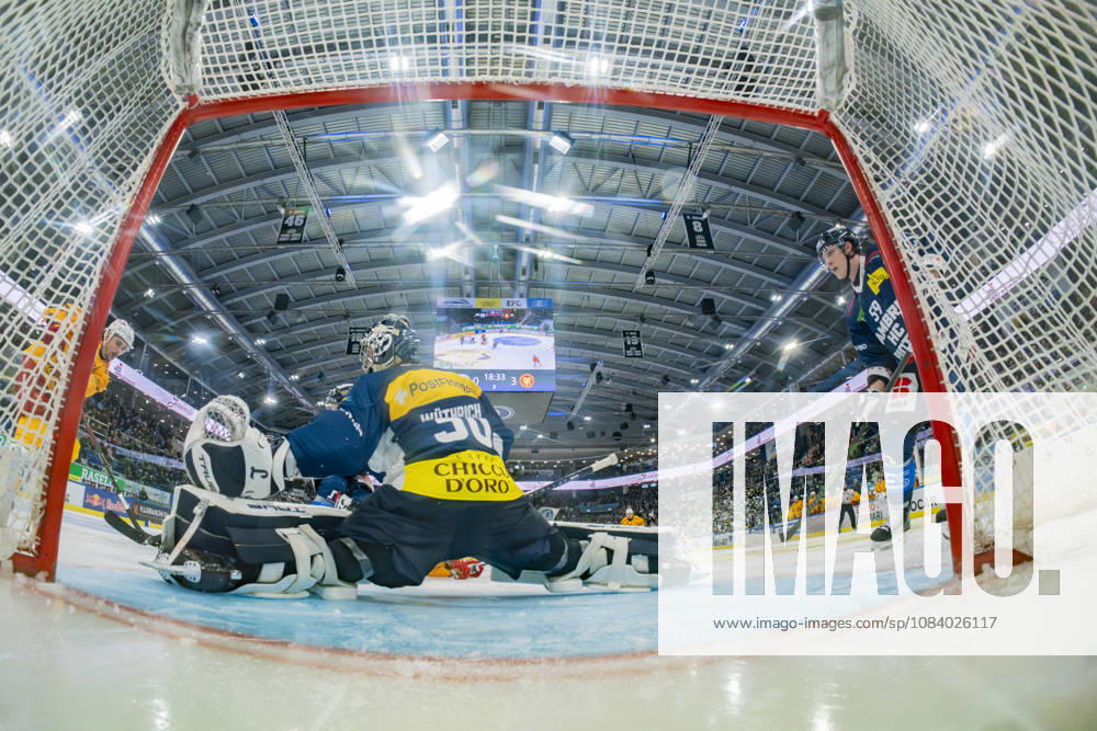 Quinto, Gottardo Arena, NL: HC Ambrì-Piotta v SCL Tigers: 30 goalkeeper Philip Wuthrich (Ambri) in action on 88 Jerome Bachofner (Tigers) Quinto Gottardo Arena Ticino Switzerland