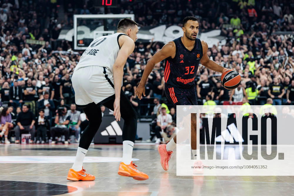 Johannes JT Thiemann (FC Bayern Muenchen, 32) controls the ball against Nikola Tanaskovic (Partizan Mozzart Bet Belgrade, 10) during the Turkish Airlines EuroLeague match between FC Bayern Muenchen vs. Partizan Mozzart Bet Belgrade at SAP Garden on round 3 of Turkish Airlines EuroLeague on October 02, 2026 in Munich, Germany. Bavaria Germany