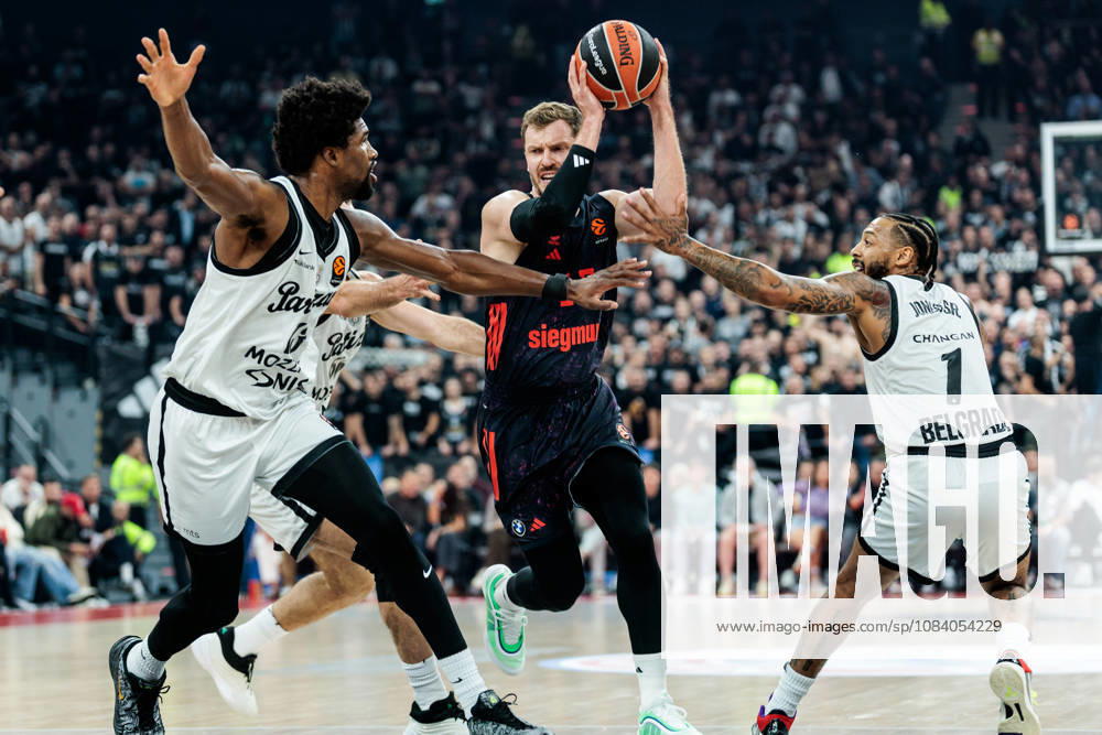 Andreas Andi Obst (FC Bayern Muenchen, 13) controls the ball against Kevarrius Hayes (Partizan Mozzart Bet Belgrade, 13) and Carlik Jones (Partizan Mozzart Bet Belgrade, 1) during the Turkish Airlines EuroLeague match between FC Bayern Muenchen vs. Partizan Mozzart Bet Belgrade at SAP Garden on round 3 of Turkish Airlines EuroLeague on October 02, 2026 in Munich, Germany. Bavaria Germany