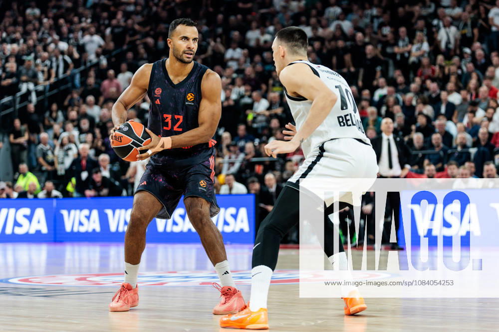 Johannes JT Thiemann (FC Bayern Muenchen, 32) controls the ball against Nikola Tanaskovic (Partizan Mozzart Bet Belgrade, 10) during the Turkish Airlines EuroLeague match between FC Bayern Muenchen vs. Partizan Mozzart Bet Belgrade at SAP Garden on round 3 of Turkish Airlines EuroLeague on October 02, 2026 in Munich, Germany. Bavaria Germany