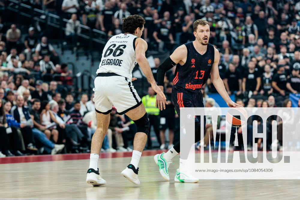 Andreas Andi Obst (FC Bayern Muenchen, 13) controls the ball against Alessandro Pajola (Partizan Mozzart Bet Belgrade, 66) during the Turkish Airlines EuroLeague match between FC Bayern Muenchen vs. Partizan Mozzart Bet Belgrade at SAP Garden on round 3 of Turkish Airlines EuroLeague on October 02, 2026 in Munich, Germany. Bavaria Germany