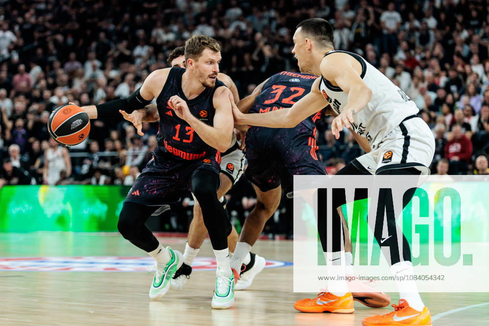 Andreas Andi Obst (FC Bayern Muenchen, 13) controls the ball against Nikola Tanaskovic (Partizan Mozzart Bet Belgrade, 10) during the Turkish Airlines EuroLeague match between FC Bayern Muenchen vs. Partizan Mozzart Bet Belgrade at SAP Garden on round 3 of Turkish Airlines EuroLeague on October 02, 2026 in Munich, Germany. Bavaria Germany