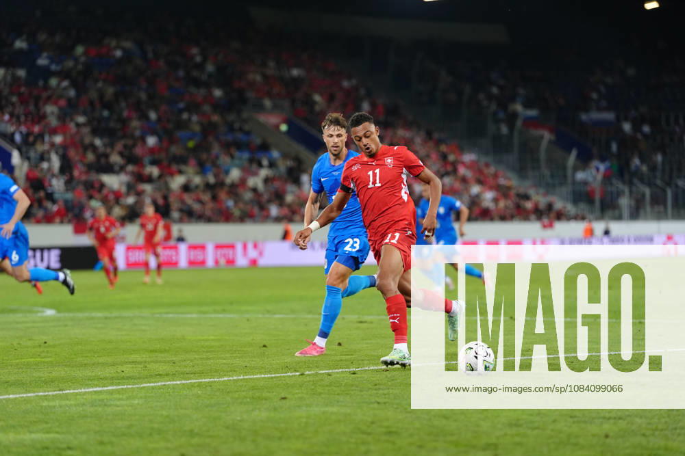 Dan Ndoye (11 SUI) against David Brekalo (23 SLO) during the UEFA Nations League match between Switzerland and Slovenia at thermoplan arena on October 03, 2026 in Luzern, Switzerland.