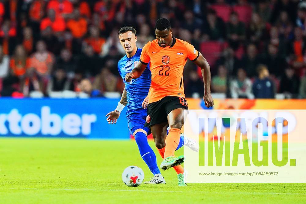 2026-10-04 UEFA Nations League: Netherlands v Serbia EINDHOVEN, NETHERLANDS - OCTOBER 4: Aleksandar Stankovic of Serbia and Denzel Dumfries of the Netherlands during the UEFA Nations League match between Netherlands and Serbia at Philips Stadion on October 4, 2026 in Eindhoven, Netherlands. Eindhoven Philips Stadion Netherlands Content not available for redistribution in The Netherlands directly or indirectly through any third parties.