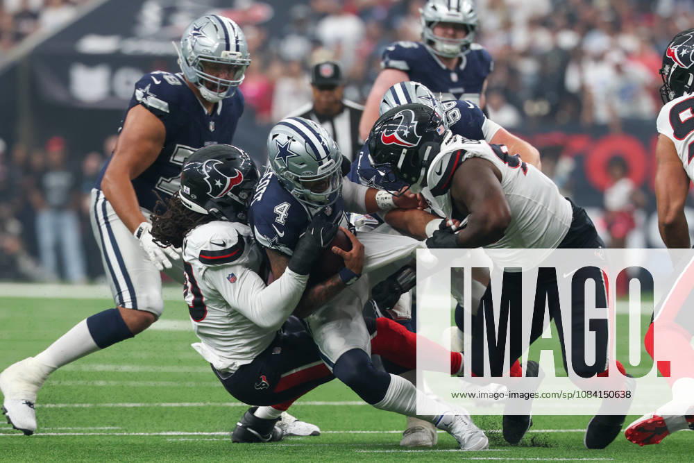 HOUSTON, TX - OCTOBER 04: Quarterback Dak Prescott 4 of the Dallas Cowboys is sacked by defensive end Jadeveon Clowney 90 of the Houston Texans during the NFL, American Football Herren, USA football game between the Houston Texans and Dallas Cowboys on October 4, 2026, at Reliant Stadium in Houston, TX. (Photo by David Buono Icon Sportswire) NFL: OCT 04 Cowboys at Texans Icon241004012