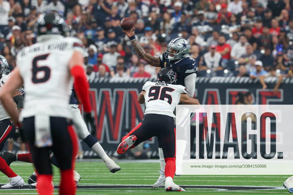 HOUSTON, TX - OCTOBER 04: Quarterback Dak Prescott 4 of the Dallas Cowboys is forced to throw early as defensive end Logan Hall 96 of the Houston Texans gets pressure up the middle during the NFL, American Football Herren, USA football game between the Houston Texans and Dallas Cowboys on October 4, 2026, at Reliant Stadium in Houston, TX. (Photo by David Buono Icon Sportswire) NFL: OCT 04 Cowboys at Texans Icon241004021