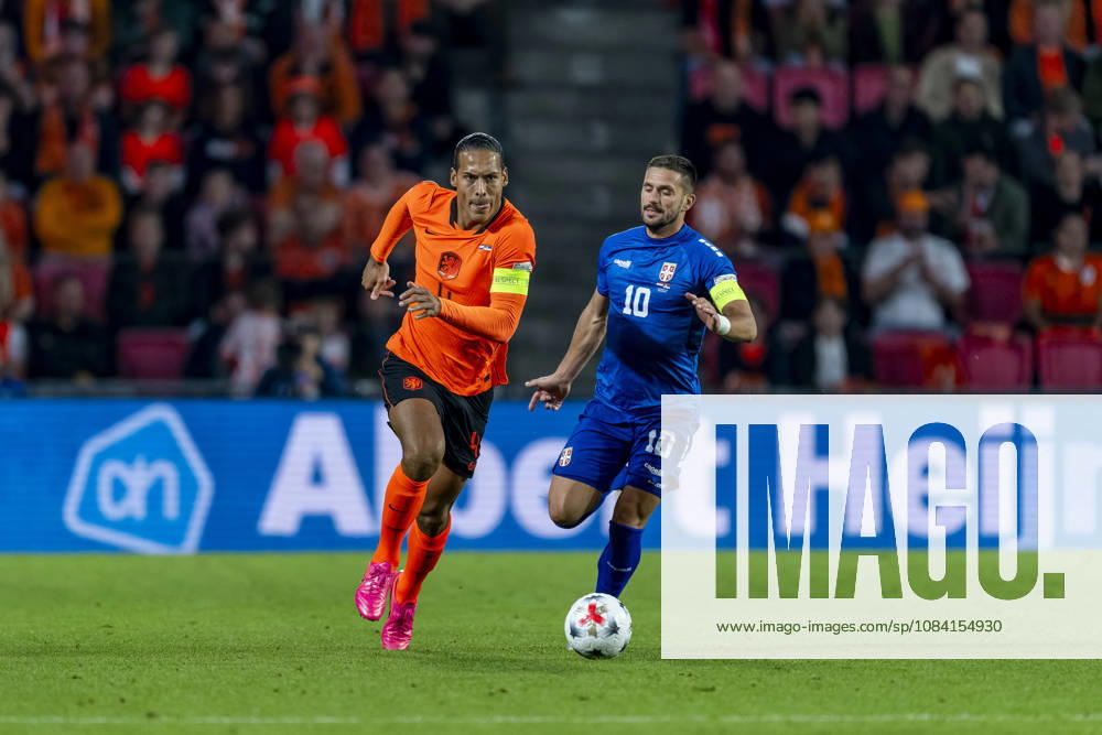 EINDHOVEN - (l-r) Nederland defender Virgil van Dijk and Servie forward Dusan Tadic during the UEFA Nations League match between Nederland and Servie at Philips Stadion on 4 oktober 2026 in Eindhoven, Nederland. (Photo by DeFodi Images) -