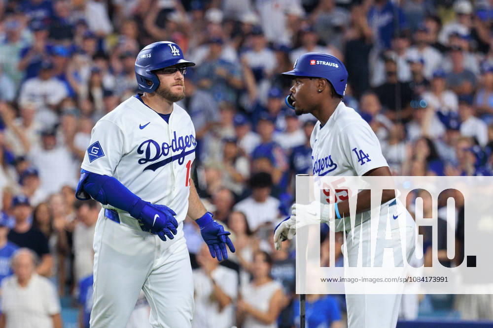 Max Muncy 13 of the Los Angeles Dodgers is congratulated by Josue De Paula 95 after hitting a solo home urn in the 9th inning during NLDS Game 2 against the Atlanta Braves on Sunday October 4, 2026 at Dodger Stadium in Los Angeles, California. Dodgers lose to Braves, 2-3. JAVIER ROJAS PI Dodgers Vs. Braves NLDS - Game 2 - ZUMAp124 20261004_zaa_p124_030