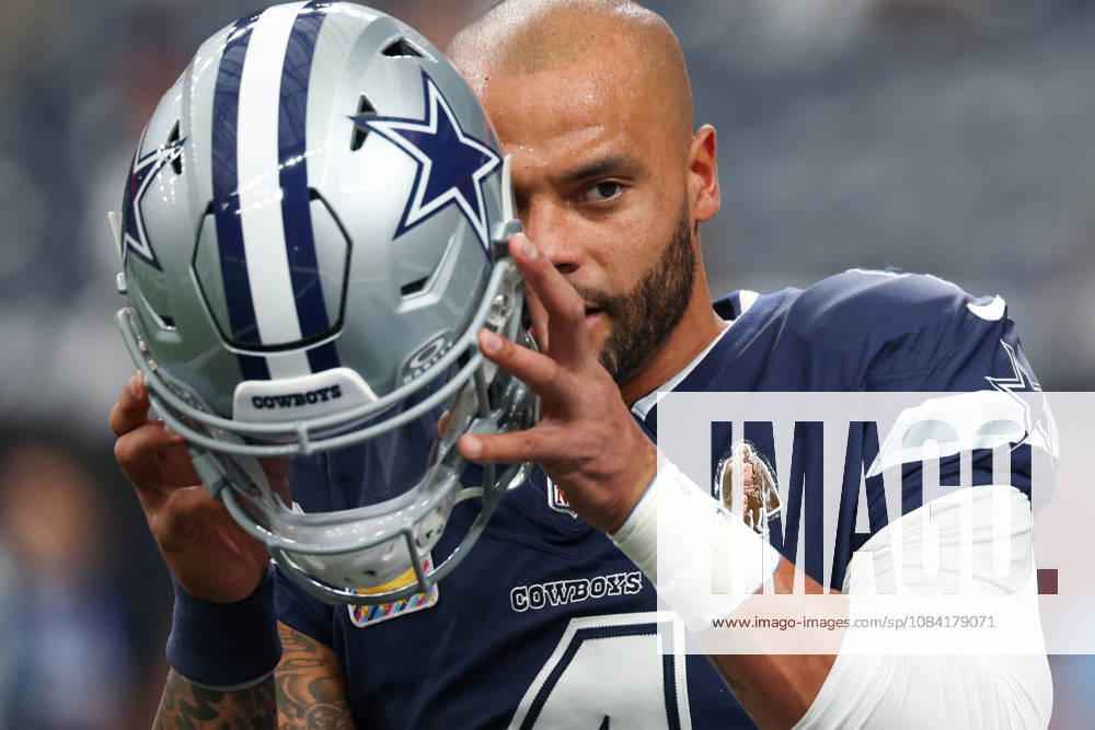 HOUSTON, TX - OCTOBER 04: Quarterback Dak Prescott 4 of the Dallas Cowboys readies to put his helmet on during warmups ahead of the NFL, American Football Herren, USA football game between the Houston Texans and Dallas Cowboys on October 4, 2026, at Reliant Stadium in Houston, TX. (Photo by David Buono Icon Sportswire) NFL: OCT 04 Cowboys at Texans Icon241004076